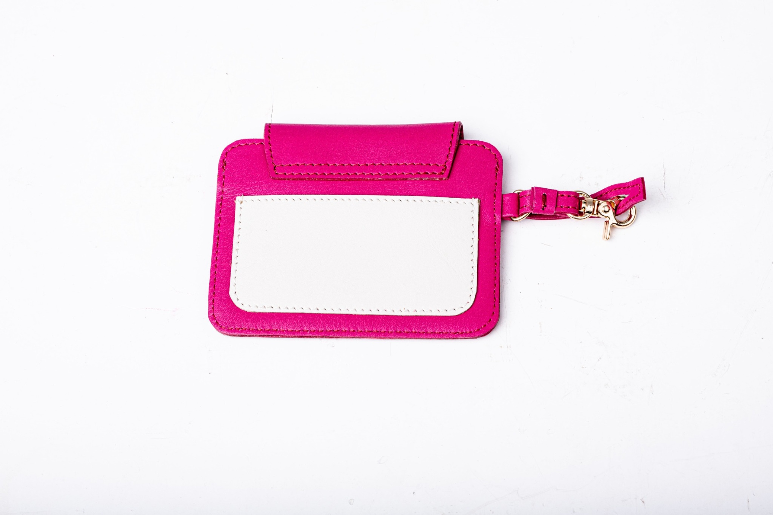 Back view of pink and white leather cassette cardholder by Kairos with wrist strap