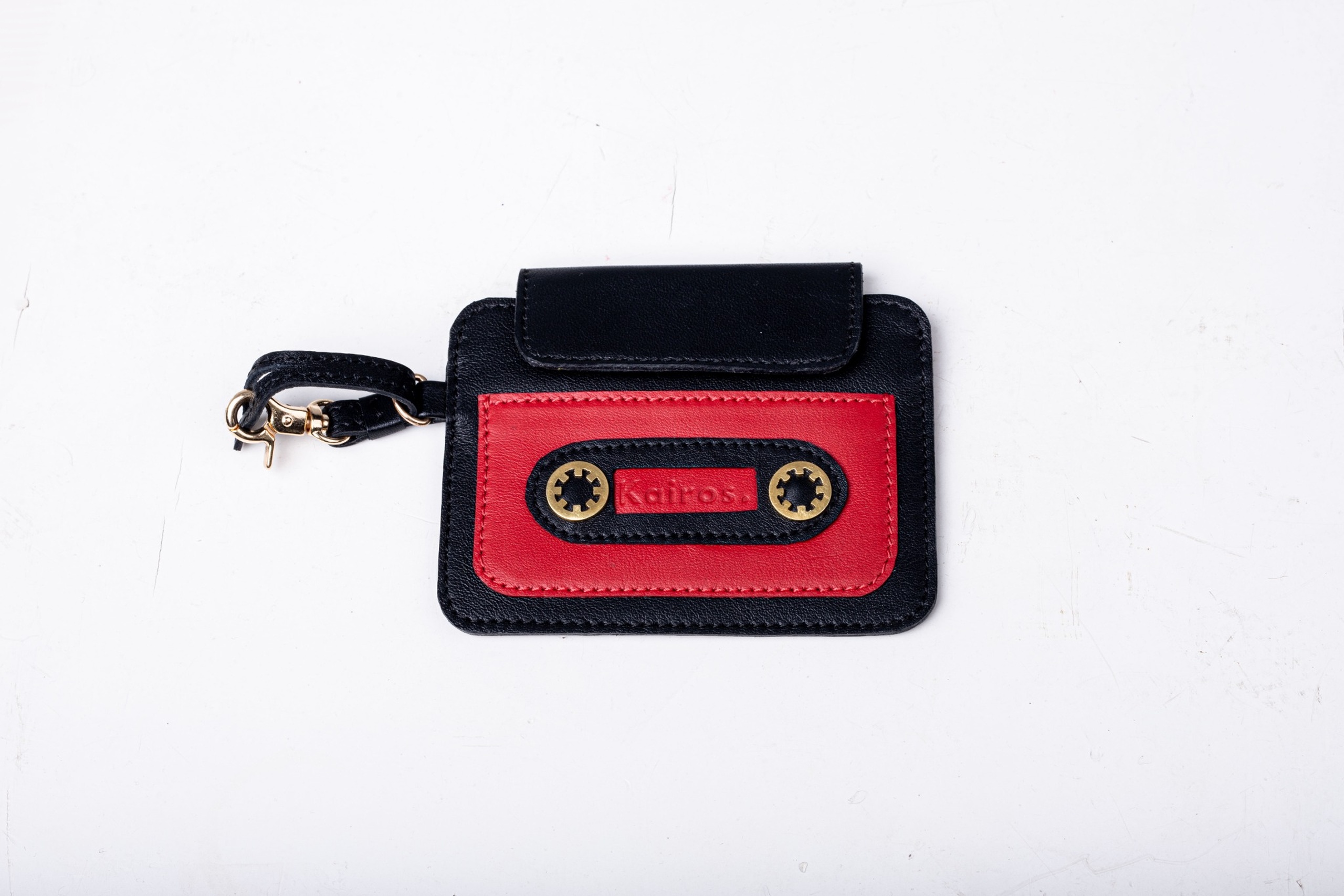 Black and Red leather cassette cardholder by Kairos with gold hardware and wrist strap
