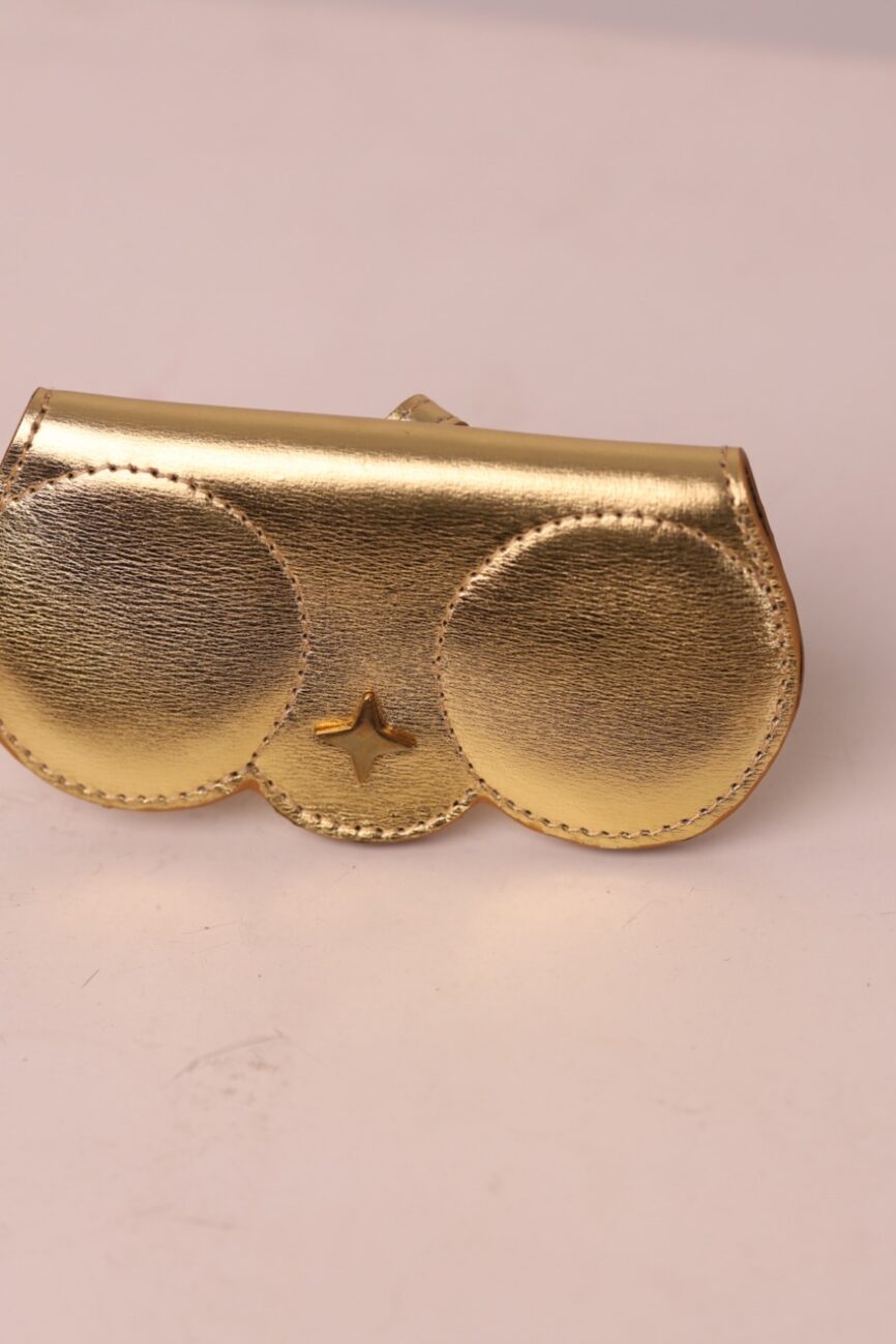 Gold leather sunglasses cover by Kairos with signature star detail